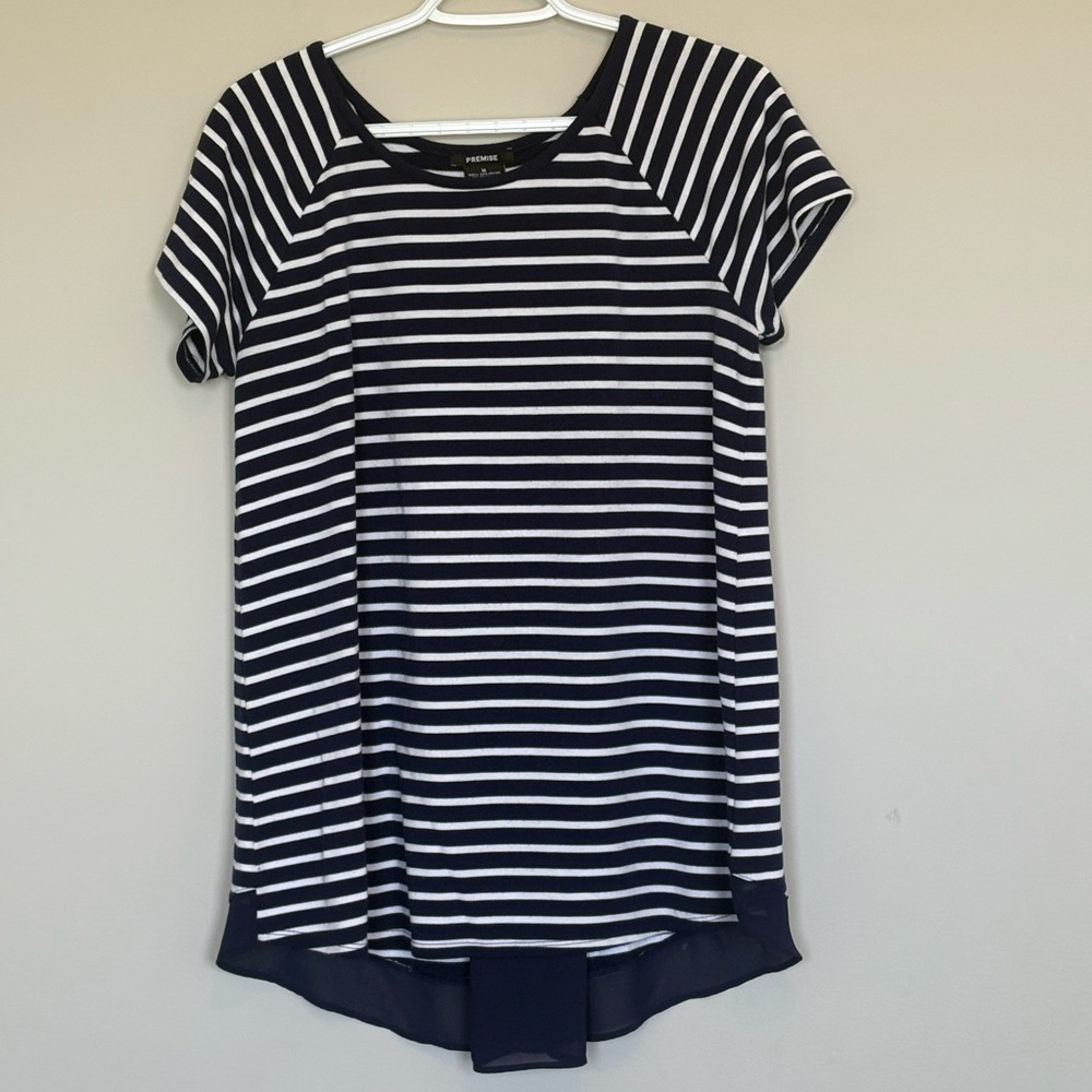 Premise navy and white striped tee with navy mesh as detail. Ladies M